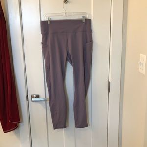 NWT Fabletics Workout Leggings. A purple color